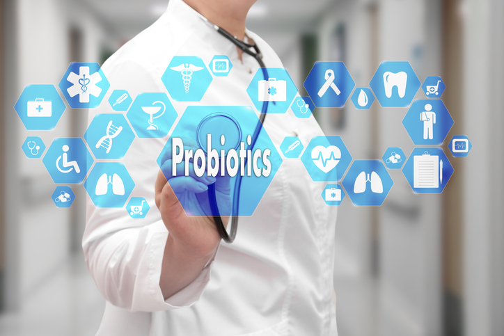 Różne szczepy bakterii probiotycznych są rozmieszczone w całym przewodzie pokarmowym, gdzie pełnią różne funkcje. Źródło: Thinkstock Ikony medyczne z osobą w białym fartuchu w tle